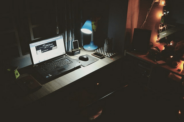 night scene of dorm room desk